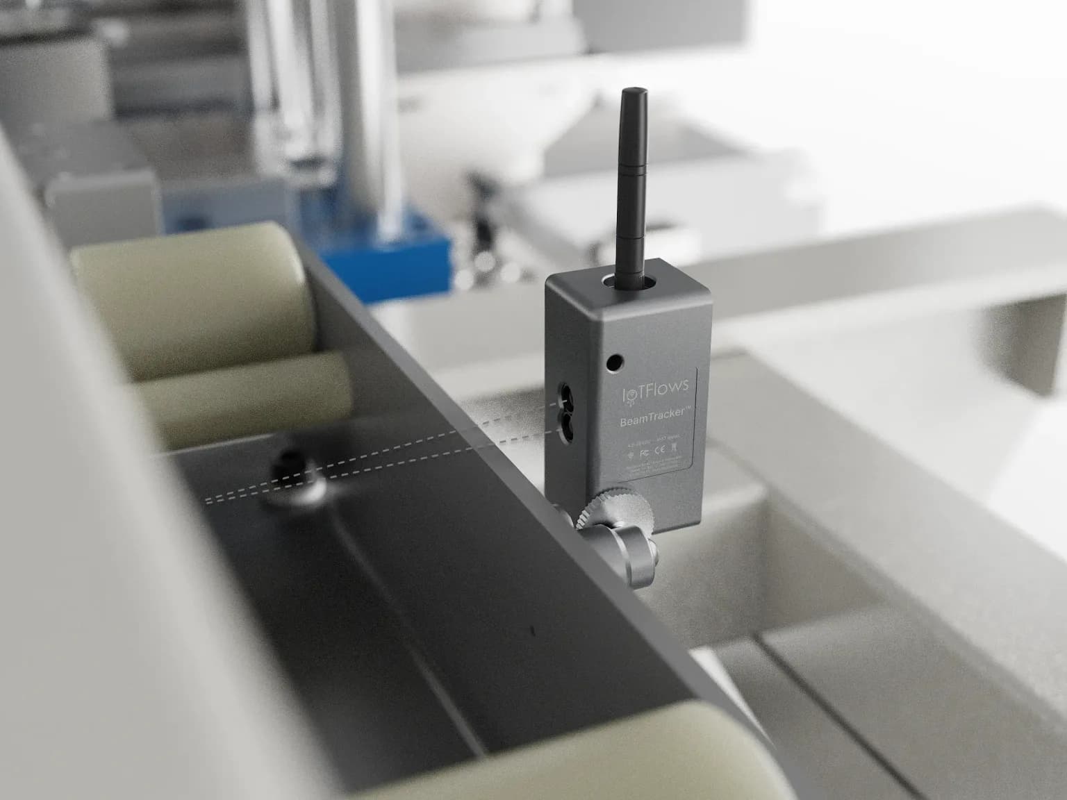 A BeamTracker mounted on a bracket at the edge of a conveyor, its beam shown as a dashed line crossing the part path to a point on the far side